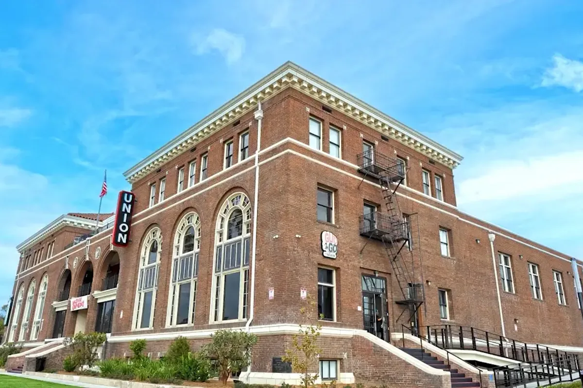 Exterior of The Union on Garey in downtown Pomona, the restored brick building that houses Take Ur Seat Cafe.